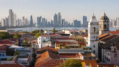 Casco Antiguo rooftops and church towers with modern Panama City across the bay