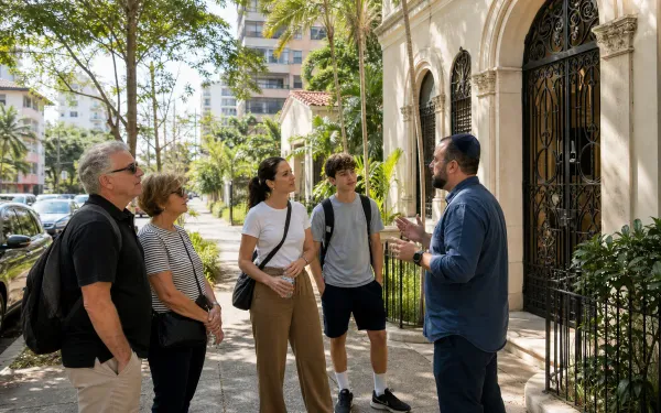 Guide sharing Panama Jewish community history with a small tour group on a city sidewalk