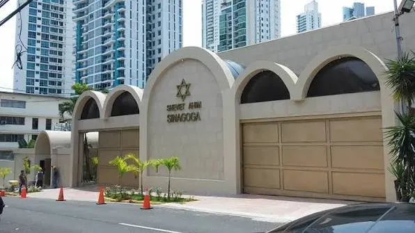 Shevet Ahim synagogue building among the towers of Panama City