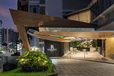 Illuminated entrance and signature wood canopy of the Renaissance Panama City Hotel
