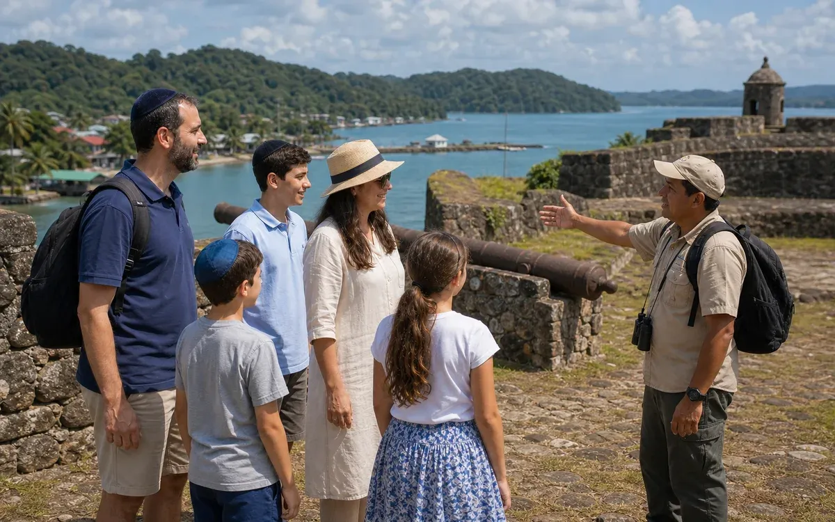 Modestly dressed family touring the historic Portobelo fort with a private guide